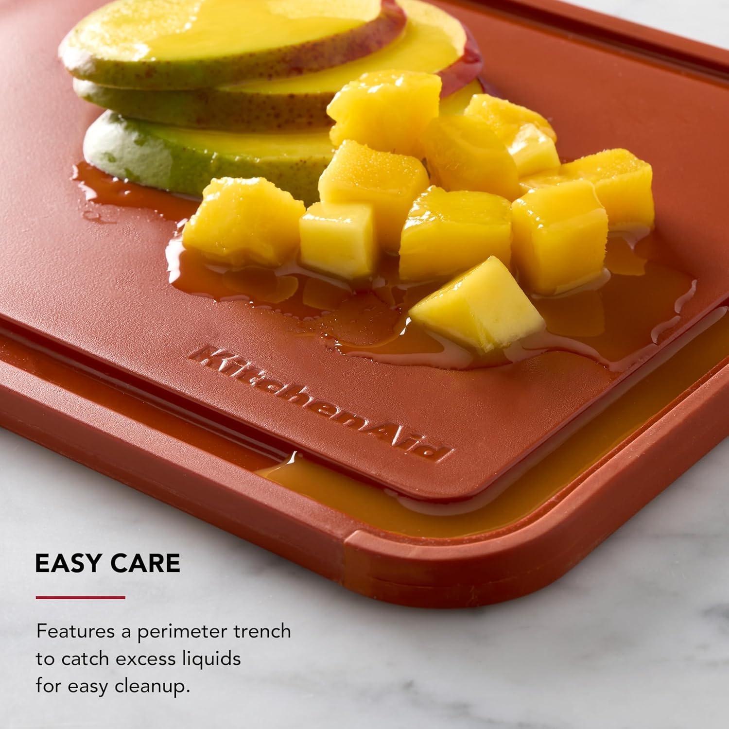 imageKitchenAid Classic Plastic Cutting Board with Perimeter Trench and Non Slip Edges Dishwasher Safe 8 x 10 inch Scorched OrangeScorched Orange