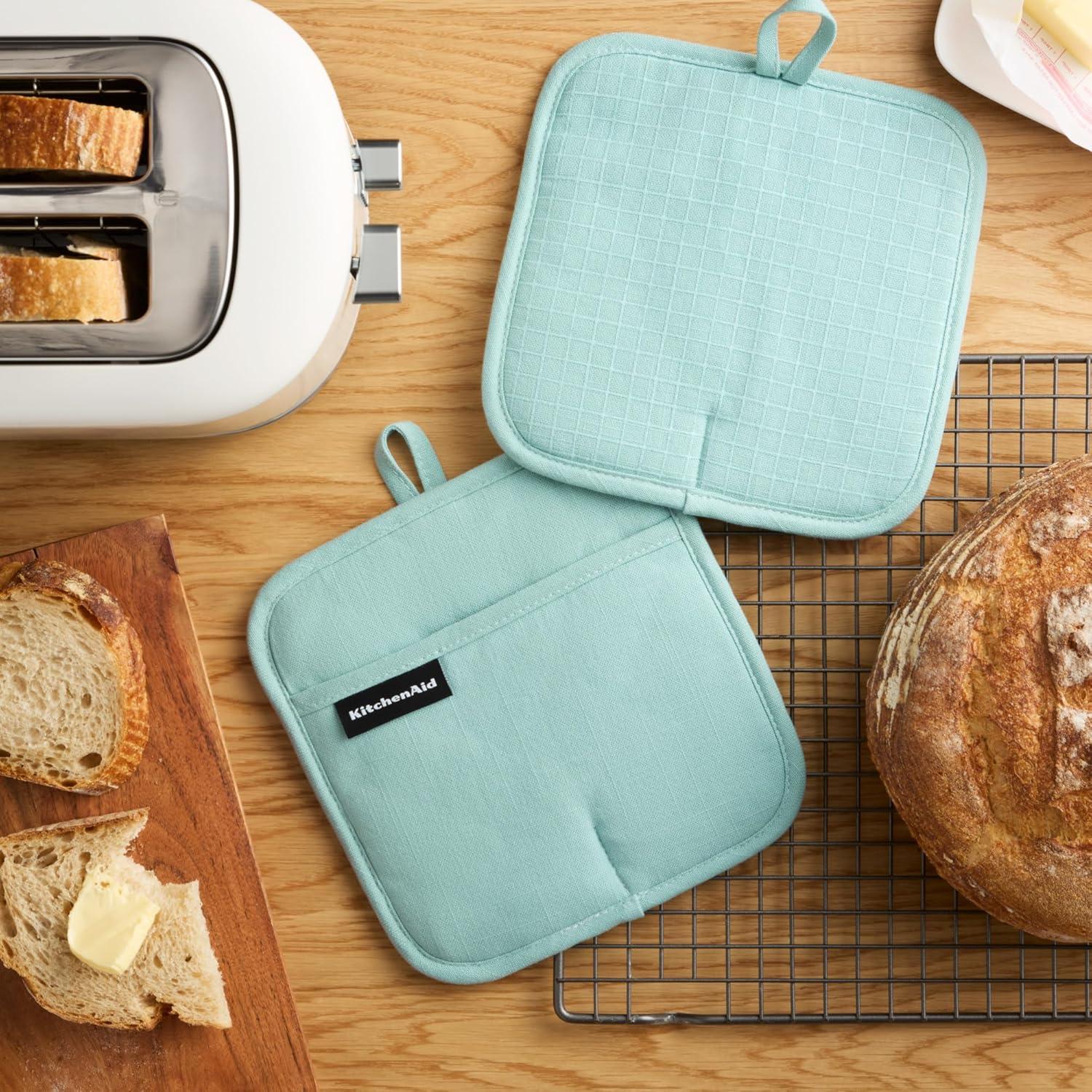 imageKITCHENAID Gourmet Series Gridlines Pot Holders 2Pack Set Heat Resistant up to 600F Soft Silicone Grip Magnetic Cuff Ink Blue 8quotx8quotMineral Water Aqua