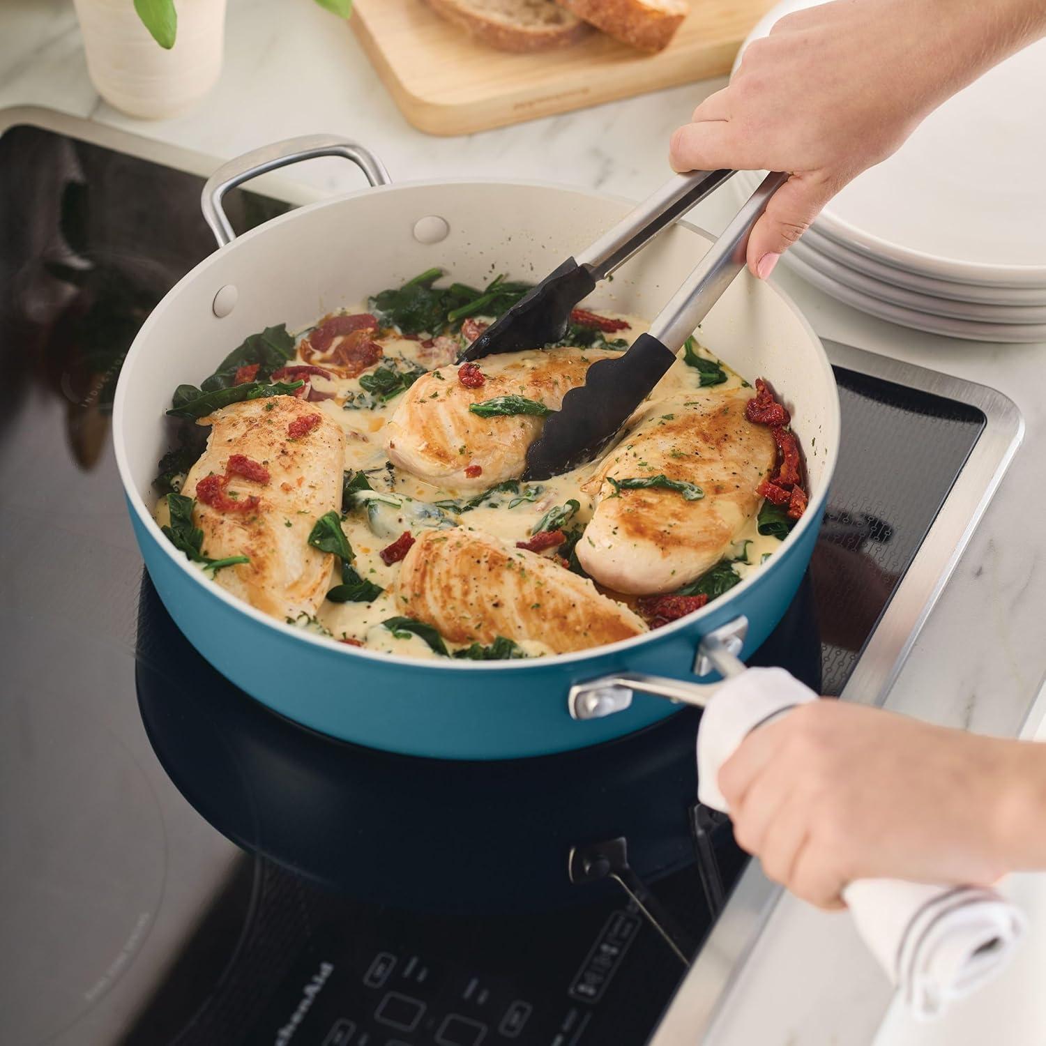 imageKitchenAid Hard Anodized Ceramic Induction Nonstick Cookware Frying PanSkillet with Lid Dishwasher Safe 1225 Inch Non Stick Fry Pan with Stainless Steel Handle PistachioAgave