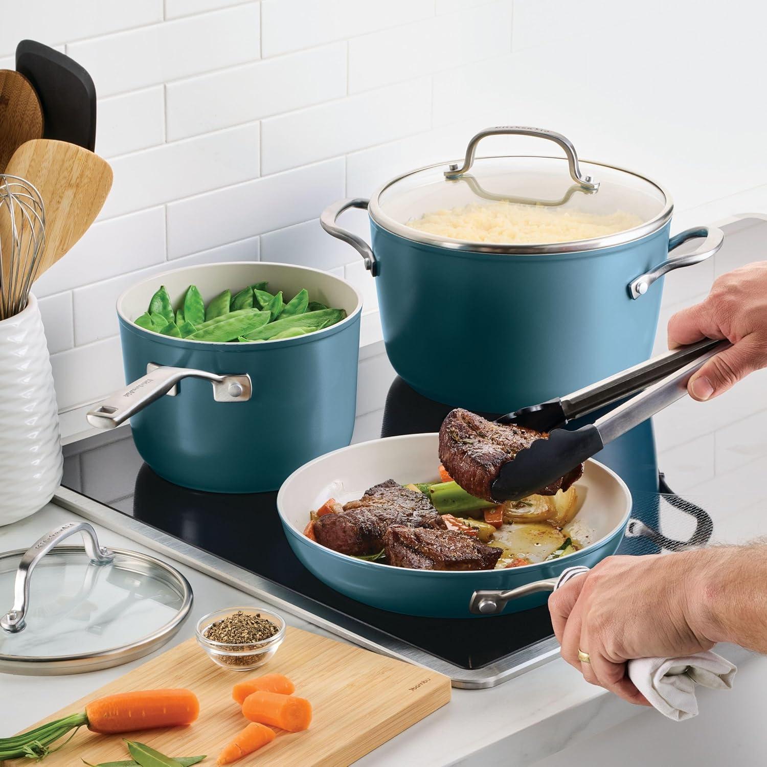 imageKitchenAid Hard Anodized Ceramic Induction Nonstick Pots and Pans with Saucepans Frying Pans Stockpot and Lids Dishwasher Safe 9 Piece Cookware Set with Stainless Steel Handles Porcelain WhiteAgave